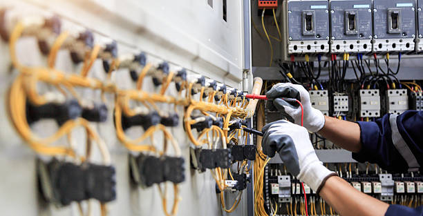 Professional Electrician technician working in Elfers, FL